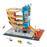 Matchbox Spielzeugautos und Spielset, Transport-Center mit 5 Etagen, von Kindern und Autos aktivierbare Funktionen, enthält Taxi, Boot und Hubschrauber im Maßstab 1:64 sowie Essensverkäufer-Accessoire