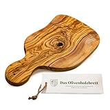 das Olivenholzbrett® / Olivenholz Schneidebrett mit Griff/Griffbrett Olivenholz/Brotzeitbrett aus Olivenholz mit Griff/Kräuterschneidebrett im Naturschnitt + Loch zur Aufhängung 30cm incl Griff